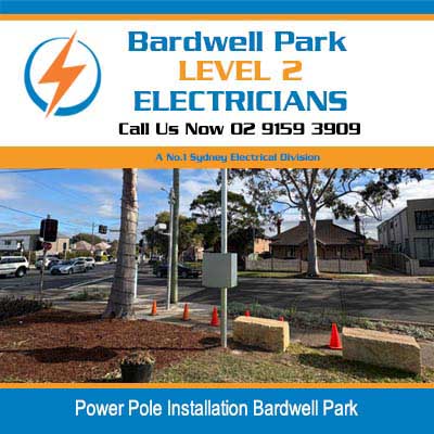 New power pole installed on residential street with safety cone in Bardwell Park